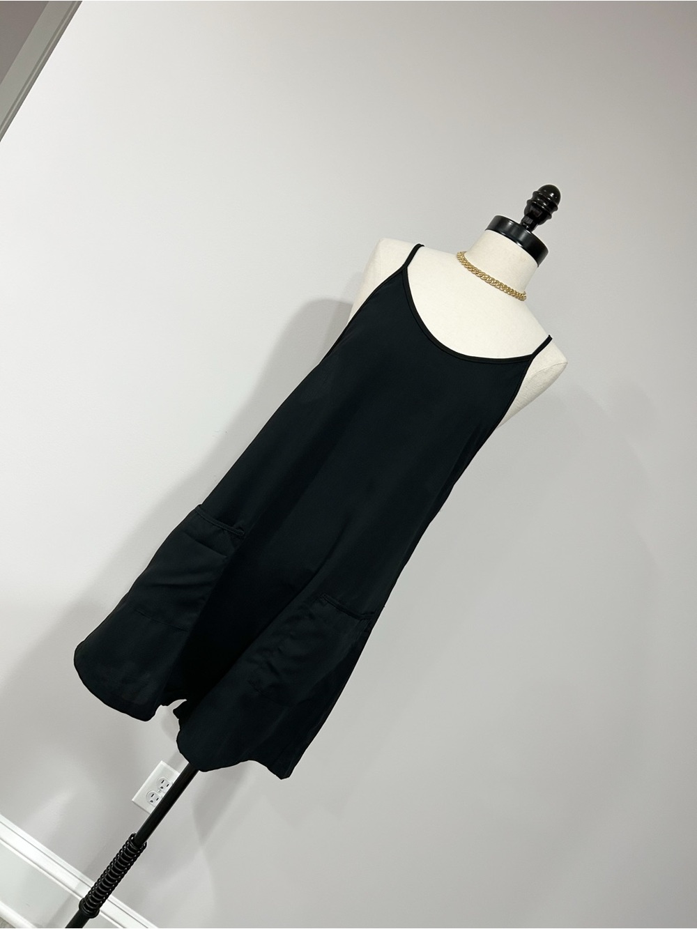 Black Sleeveless Spaghetti-Strap Romper with Front Pockets